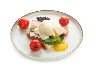 Plate with tasty egg Benedict and tomatoes on white background