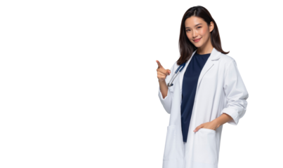 Smiling Asian female doctor in a white lab coat and stethoscope, pointing forward with a friendly and encouraging expression