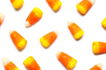 Tasty Halloween candy corns isolated on white background, closeup