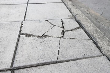 Broken sidewalk concrete block texture background