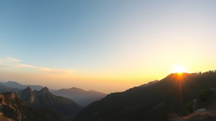 Obraz premium A beautiful sunrise view of mountains with the sun beaming through the peaks.