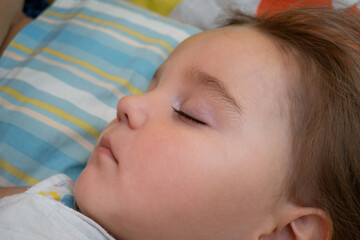 Portrait of a cute sleeping baby
