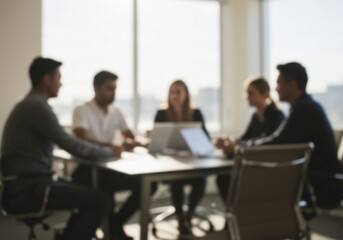 Blurry silhouette of a business team meeting in a modern office.