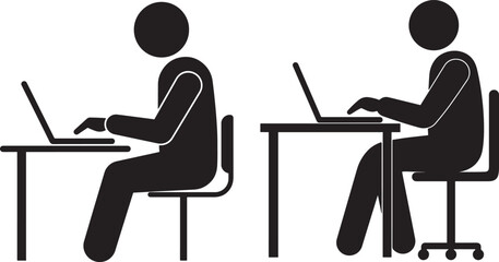 Two people working on laptops at desks silhouette