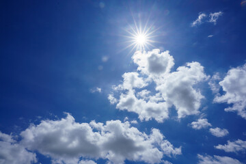 Bright Blue Sky with White Fluffy Clouds