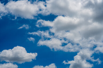Bright Blue Sky with White Fluffy Clouds