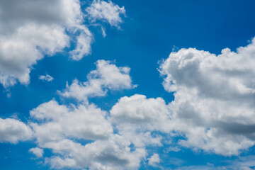 Bright Blue Sky with White Fluffy Clouds