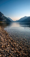 Tranquil lake shore at dawn
