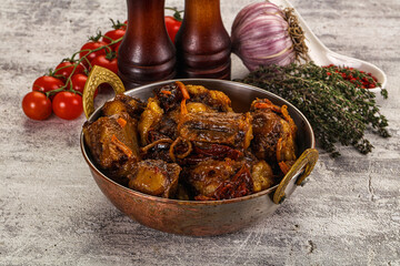 Baked oztail with tomato and carrot