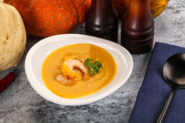Pumpkin cream soup with prawns