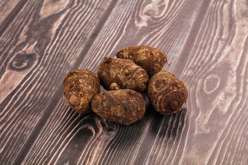 Brown topinambur roots for cooking