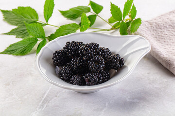 Raw sweet juicy blackberry in the bowl