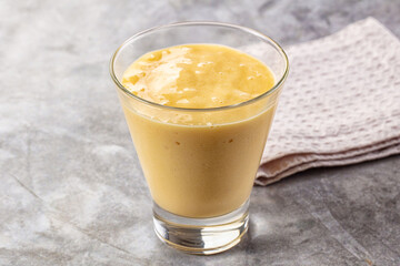 Sweet mango smoothie dessert glass