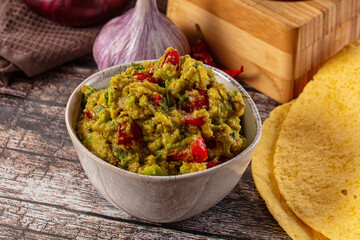 Green spicy Mexican guacamole dip