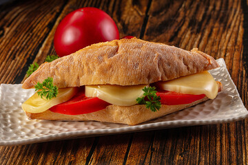 Sandwich with mozzarella and tomato