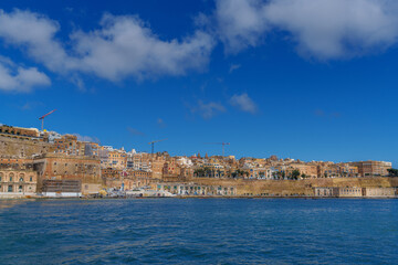 Seaside Limestone Skyline under Bright Blue Sky, Valletta Waterfront