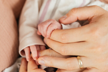 Beautiful closeup of baby feet and hands.	
