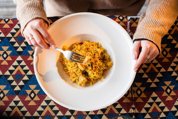Dining with Rice Dish on Geometric Tablecloth