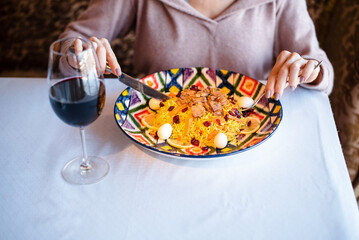 Elegant Dining with Colorful Pasta and Red Wine
