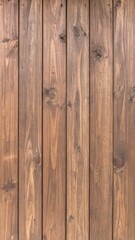 Naklejka premium Vertical wooden planks with knots and brown tones