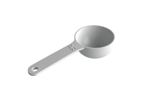 A small, white measuring spoon against a black background