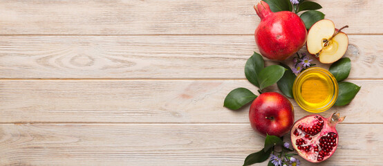 Flat lay composition with symbols jewish Rosh Hashanah holiday attributes on colored background, Rosh hashanah concept. New Year holiday Traditional. Top view with copy space