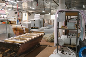 Furniture factory producing sofas, wooden frame and foam materials