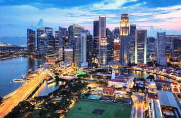 Aerial view of Singapore business district and city at twilight in Singapore, Asia
