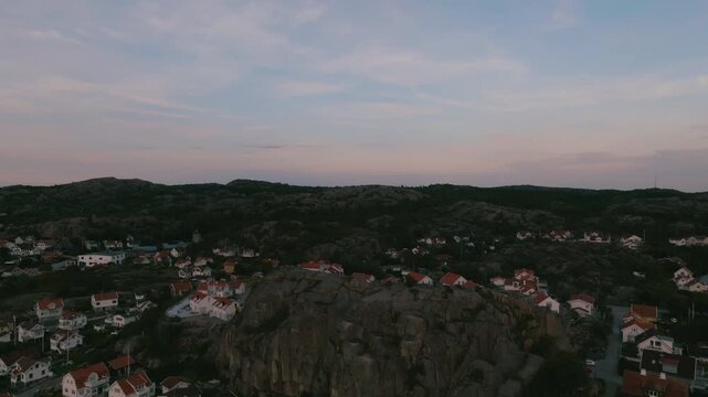 Drone Flying over Bohusl&auml;n Coastal Fishing Village at Sunset