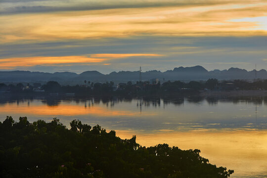 Sunset over border short of Mea-Kong river between Thailand and Laos