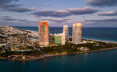 Obraz premium Top view of South Miami Beach and the ocean. Miami skyline with skyscrapers. Aerial view of Miami in summer. Miami shore with luxury buildings.