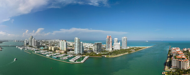 Iconic Miami coastline. Cloudy sky over Miami famous skyline.