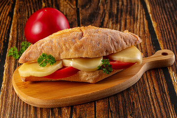 Sandwich with mozzarella and tomato