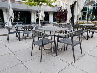 Empty tables of street cafe.