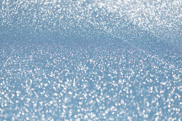 Bokeh shimmering background. Blurred defocused background. Blur glitter backdrop. Glitter shimmer background. Defocused shimmer. Bokeh backdrop shimmer. Bokeh effect. Glitter shine