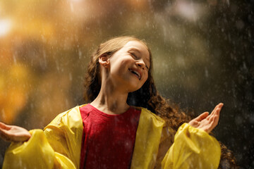 girl in the rain on an autumn walk