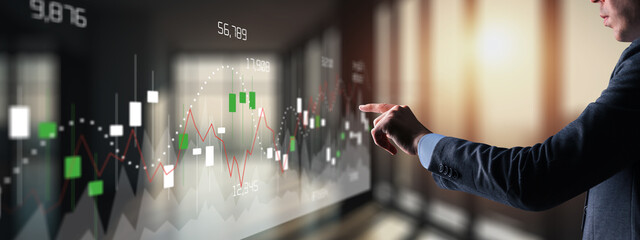 Business growth chart with burning candle on stack of coins, financial success concept