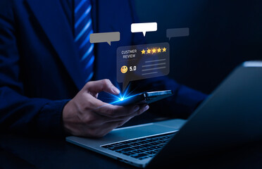 Businessman using smartphone and laptop with customer review and 5-star rating icons, concept for online feedback, digital marketing, user satisfaction, and brand reputation management.