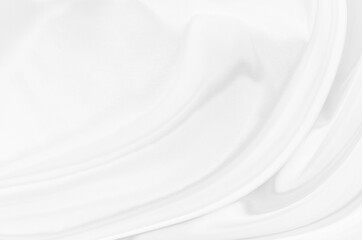 White gray satin texture that is white silver fabric silk background with beautiful soft blur pattern natural.