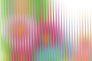 Abstract colorful vertical lines create a vibrant gradient background texture