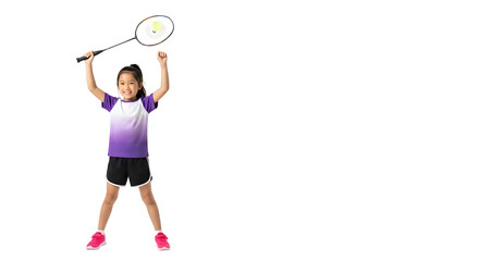 Young girl celebrating a badminton win with racket raised high.