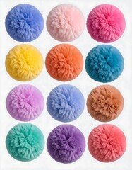 Colorful pom-poms arranged in a grid