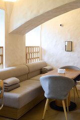 A Beautiful Modern Minimalist Interior Featuring a Cozy and Inviting Seating Area for Relaxation