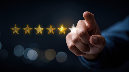 Hand pointing at golden stars