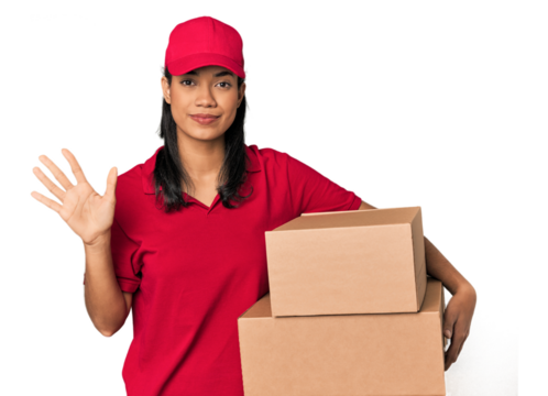 Young Filipina courier with two packages smiling cheerful showing number five with fingers.