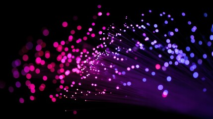 Radiant display showcases a luminous, abstract presentation of fine, light-emitting strands and glowing orbs, creating a vivid gradient transition from vibrant magenta to cool violet shades, all...