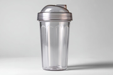 Clear plastic empty shaker cup for fitness protein powder, health drinks, or gym hydration, promoting active lifestyles, wellness, and exercise routines
