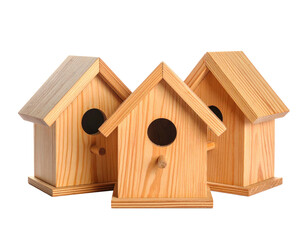 Three wooden birdhouses, arranged closely together with black background