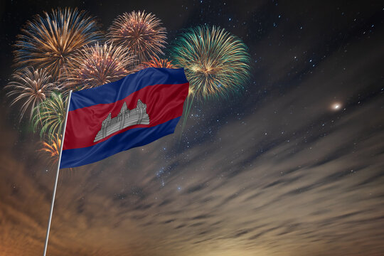 Waving National flag of Cambodia and holiday fireworks - Powered by Adobe