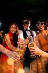  A group of beautiful girls at a company party, drinking, celebrating New Year, club party with friends.